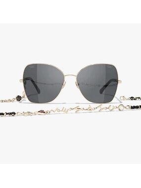 CHANEL Gold Frame Sunglasses with Dark Gray Lenses and Logo Chain